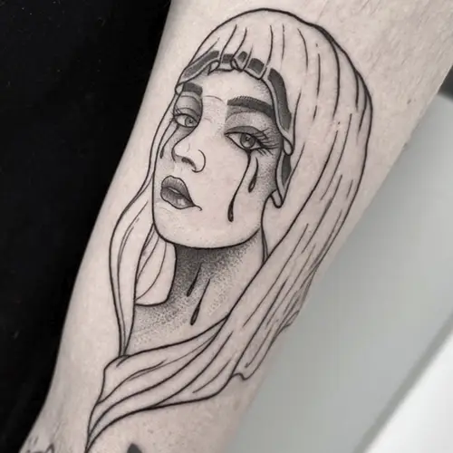 Linear woman tattoo